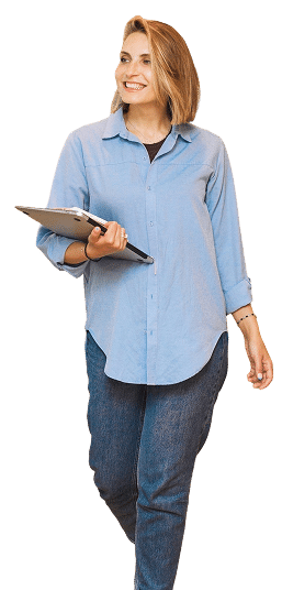 A smiling woman holding a laptop.